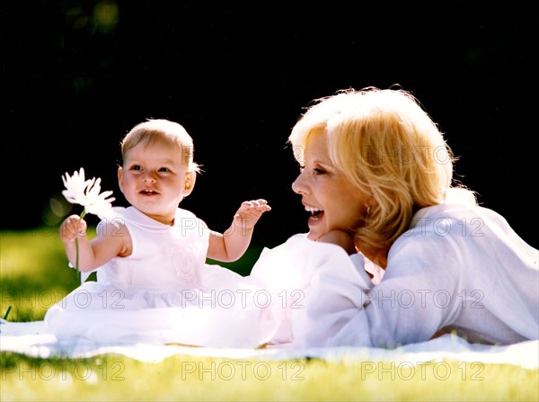 Sylvie Vartan and her adoptive daughter, Darina.