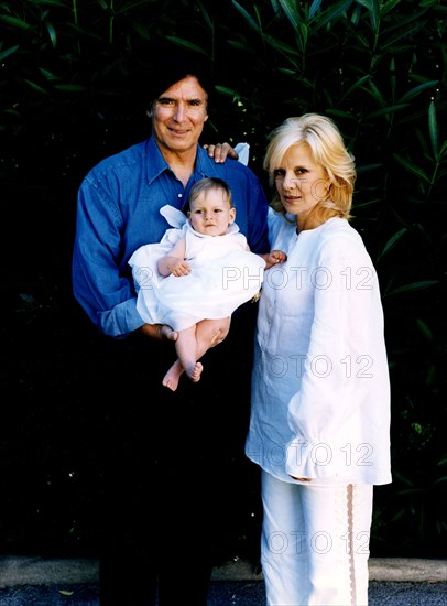 Sylvie Vartan, her husband Tony Scotti, and their adoptive daughter, Darina.