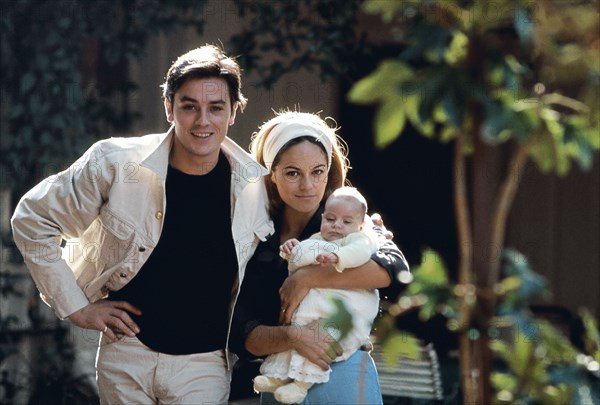 Alain Delon with his wife and son