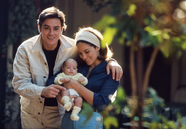 Alain Delon with his wife and son