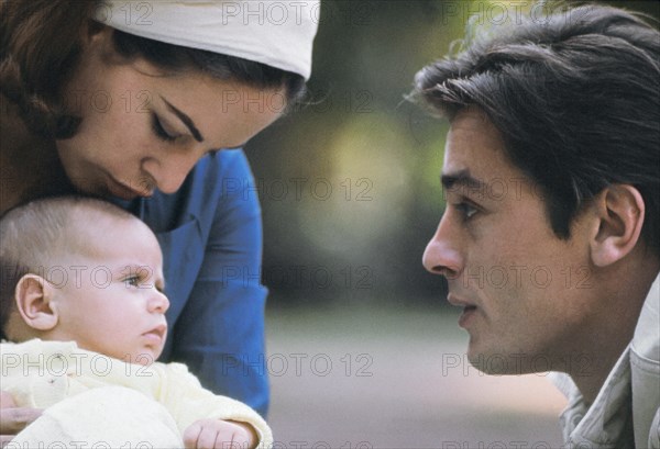 Alain Delon with his wife and son