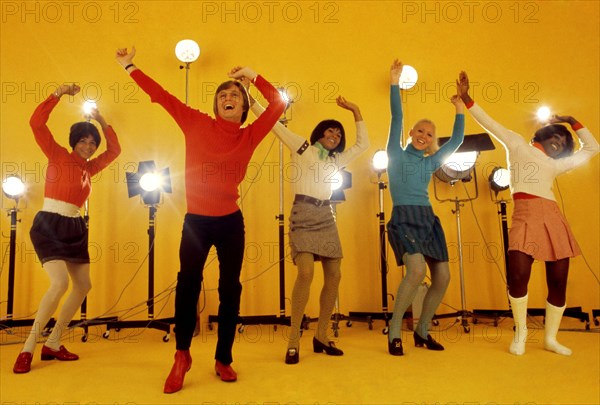 Claude François in Paris with his 'Claudettes', 1968