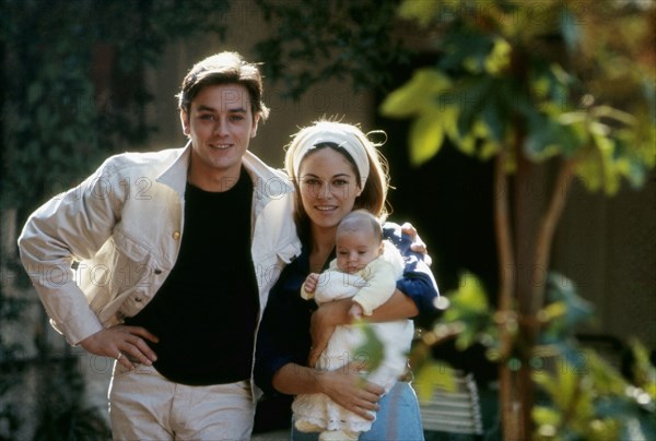 Alain Delon with his wife and son