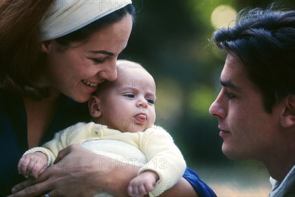 Alain Delon with his wife and son