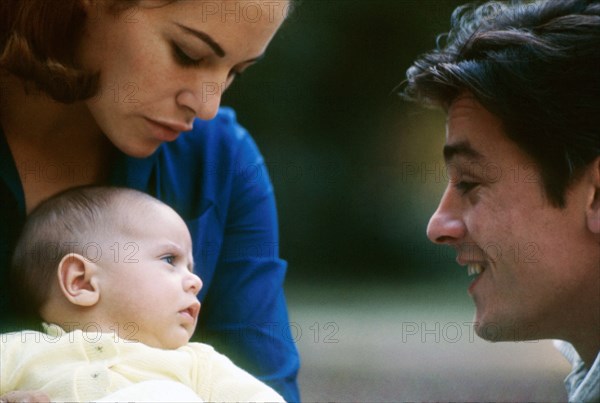 Alain Delon with his wife and son