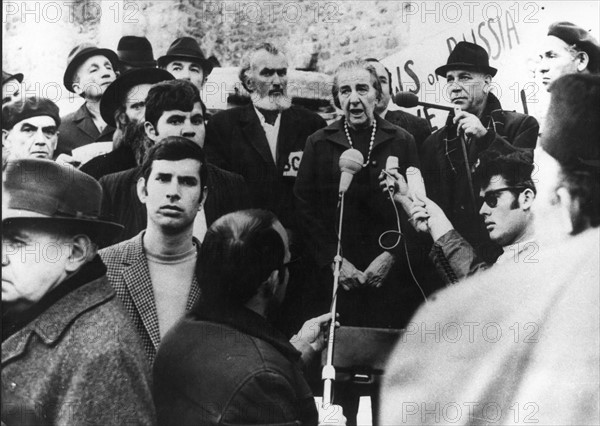 Israeli Prime minister Golda Meir standing by the Wailing Wall, 1970