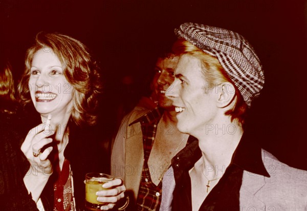 Angie and David BOWIE at a party
