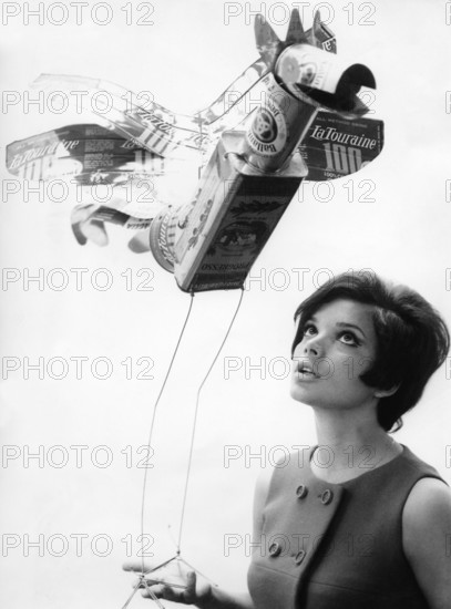 Uschi GLAS with mobile made of cans, Berlin 1967