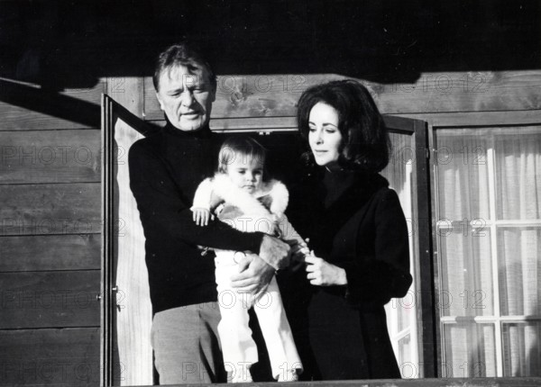 Elizabeth TAYLOR and Richard BURTON with grandchildren
