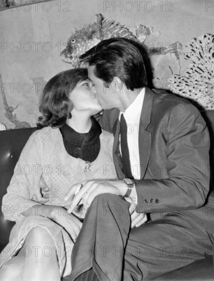 Alain DELON kisses his wife Nathalie CANOVAS, 1965