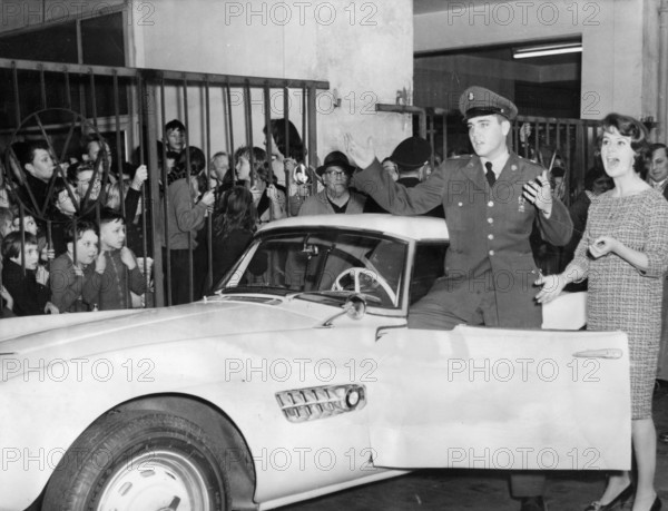 Elvis PRESLEY with a new BMW sports car, Frankfurt 1958