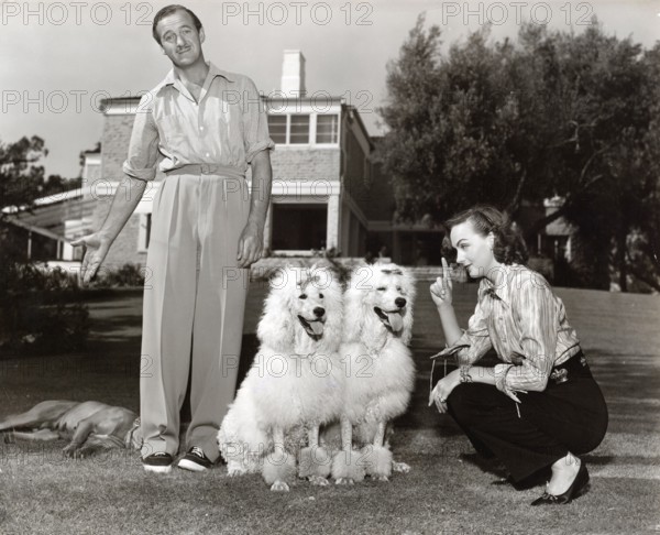 David NIVEN and wife Hjordis with dogs