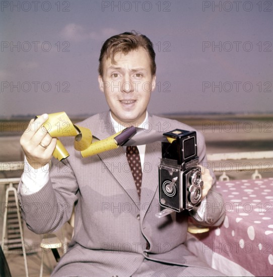 Peter ALEXANDER with camera