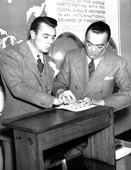 John Edgar HOOVER is fingerprinted