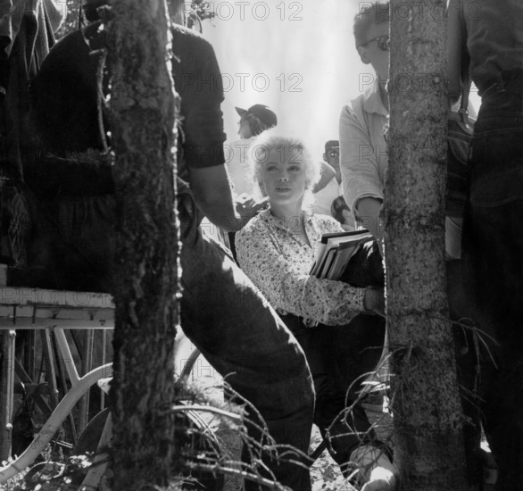 Marilyn MONROE at a director's meeting, 1955