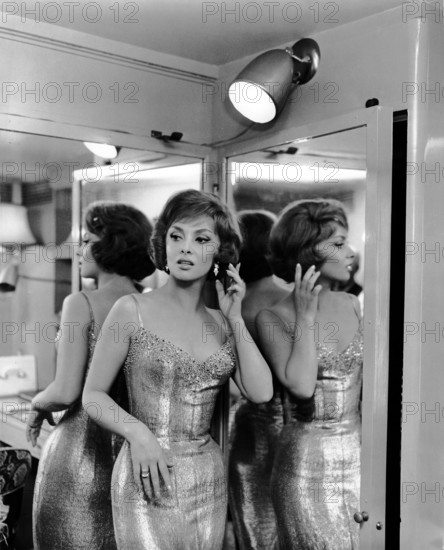 Gina LOLLOBRIGIDA in a gold dress