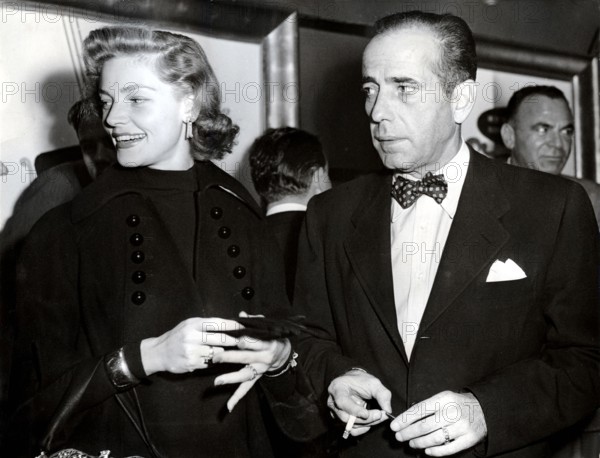 Lauren BACALL and Humphrey BOGART wrestling