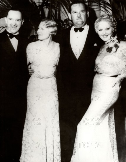 Stan LAUREL and Oliver HARDY with two women