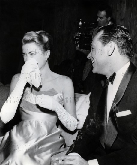 Grace KELLY and William HOLDEN at a party