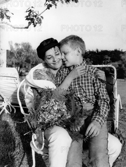 Jeanne MOREAU with her son Jerome in St. Tropez, 1961