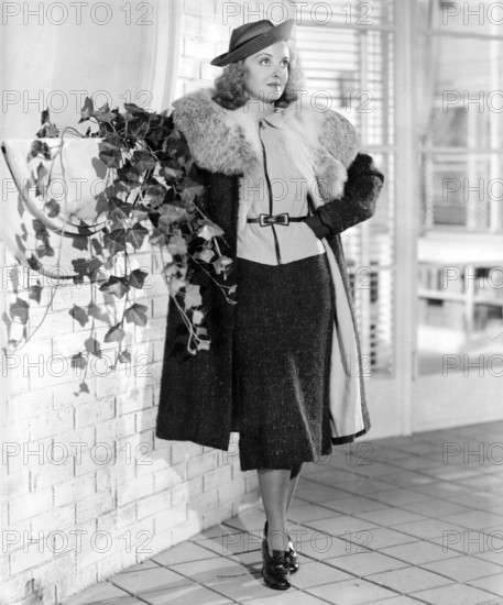 Bette DAVIS poses in a costume, 1937