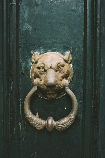 Venice: detail of a door handle.