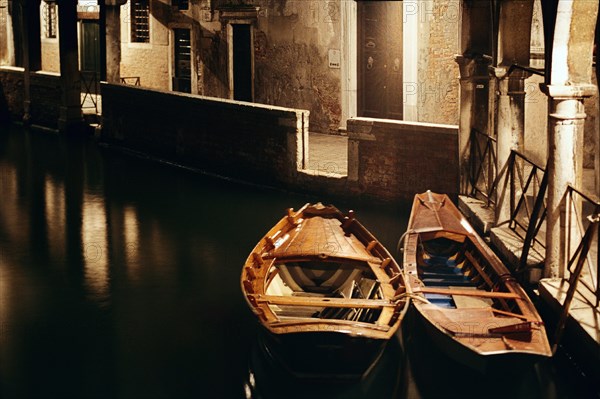 Two boats on the canal in Venice