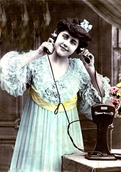 Postcard of a young woman on the phone
