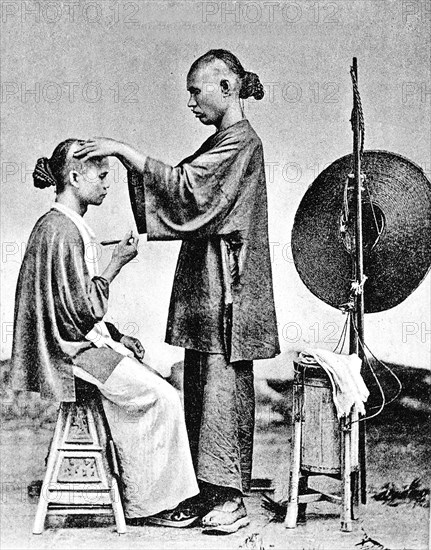 Barbier ambulant en CHINE