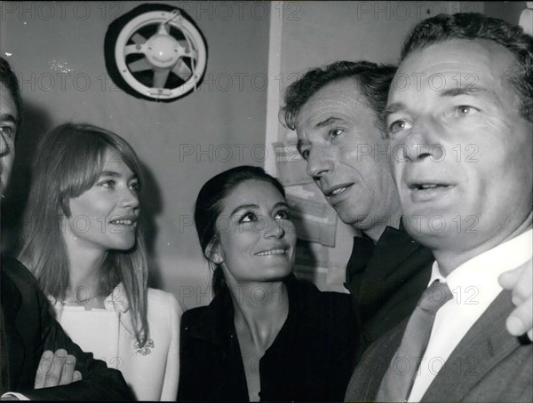 Sep. 20, 1968 - Yves Montand was on stage for two hours Thursday night at the Olympia. After his show, Yves Montand is surrounded by his friends who have come to congratulate him at his dressing room. From left to right: Francoise Hardy, Anouk Aimee, Yves
