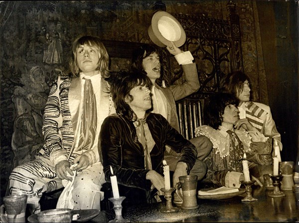 Dec. 05, 1968 - Custard Pie Throwing at Beggars Banquet given by rolling Stones: The Rolling stones today held a Beggars Banquet, with serving wenches, etc, to which a number of journalist friends, television folk El Al, were invited, in the Elizabethan Room, Gore Hotel, Queensgate. The Banquet was rounded up with a custrad pie battle.Picture Shows: The Rolling Stones, Suitably garbed for the banquet-. They are (L to R): Brian Jones; Keith Richard: MIck Jagger; Bill Wyman, and Charlie Watss.