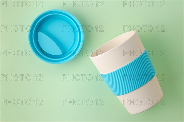 Reusable resistant bamboo coffee cup. Plactic free concept. Eco friendly utensils concept