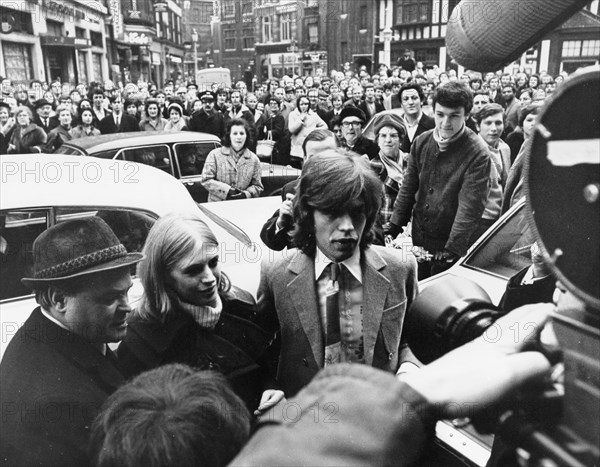 Mick Jagger, of The Rolling Stones, and girlfriend Marianne Faithfull arriving at court to face drug charges, 1970 Â© JRC /The Hollywood Archive - All Rights Reserved  File Reference # 32368_159THA