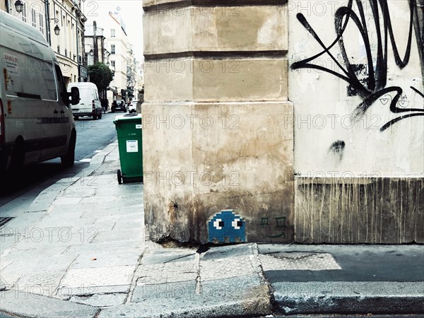 PacMan mosaic by Invader street artist In Paris