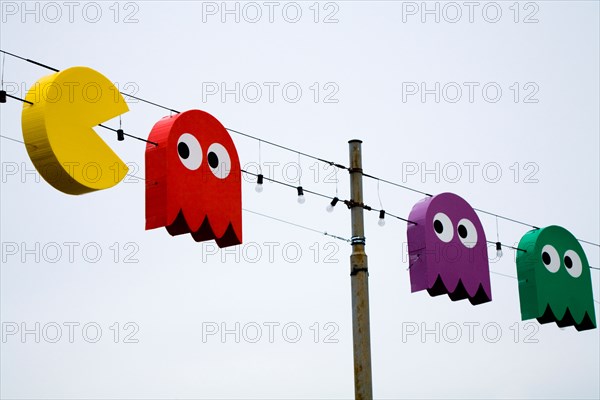 Swiss Christmas lights in shape of Pac Man / Pac Men / Pacman video game characters, by Lac / Lake Geneve. Geneva. Switzerland.