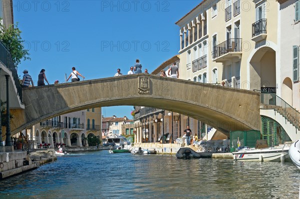 Waterside houses and boats in the resort of Port Grimaud, Var, Provence, France