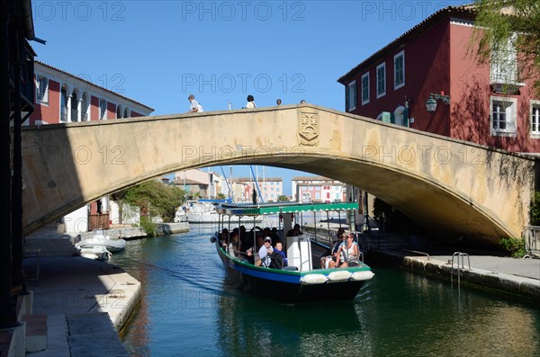 Boat Trip and Pedestrian Bridge in the Port Grimaud Resort Town Var CÃ´te d'Azur Provence France