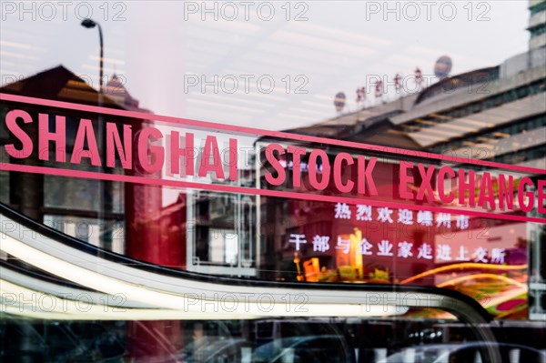 SHANGHAI, CHINA - January 2018: Shanghai stock exchange sign on glass window in China's most developed