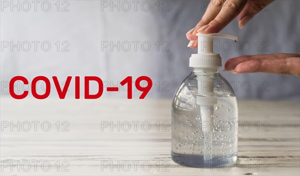 Hand sanitizer for prevention of coronavirus covid-19 pandemic with letters.