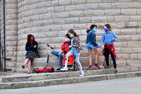 Two mothers and their children outside the Sagrada Familia, Barcelona.