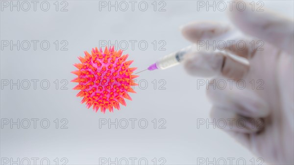 Scientist takes samples for Covid 19 vaccination. Female laborant holding medical tube with samples of vaccine. Preventive medications for Coronavirus