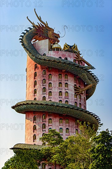 The pink tower with giant dragon at Wat SamPhran - Dragon temple, Nakhon Pathom, Thailand