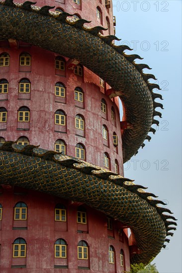 The part of pink tower with giant dragon at Wat SamPhran - Dragon temple, Nakhon Pathom, Thailand