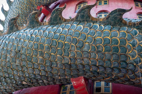 Nakhon Pathom, Thailand-February, 2020:Wat Samphran Dragon Temple in the Sam Phran District.Buddhist temple has a dragon wrapped around it.