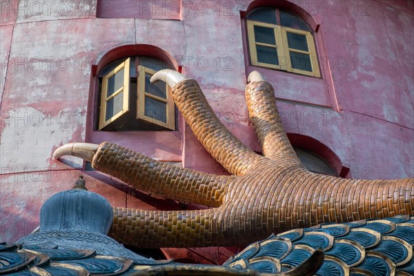 Nakhon Pathom, Thailand-February, 2020:Wat Samphran Dragon Temple in the Sam Phran District.Buddhist temple has a dragon wrapped around it.