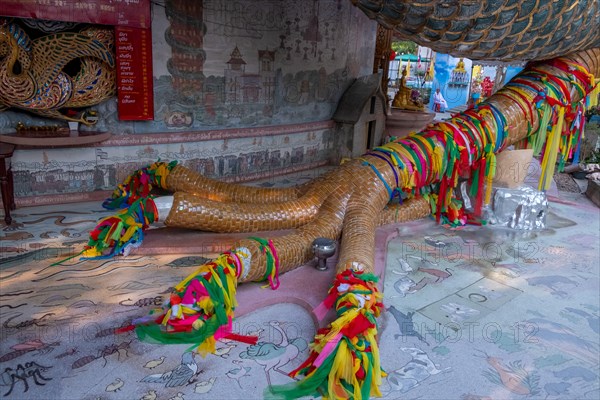 Nakhon Pathom, Thailand-February, 2020:Wat Samphran Dragon Temple in the Sam Phran District.Buddhist temple has a dragon wrapped around it.