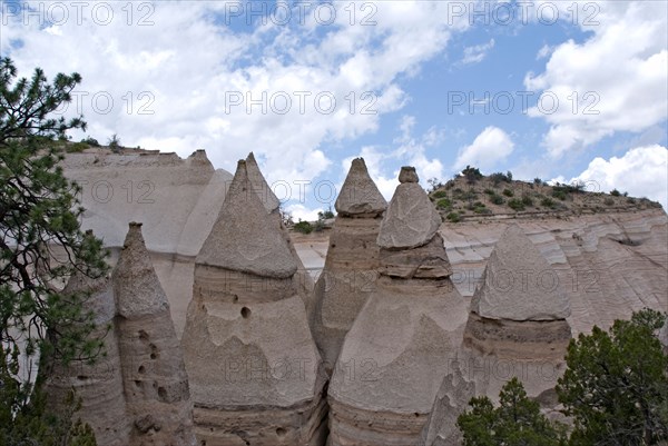 A group of 6 tent rocks at at the Kasha-Katuwe Tent Rocks National Monument