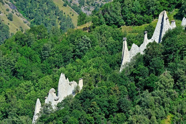 The Pyramids of Euseigne in the canton of Valais, Switzerland. Rocks of harder stone stacked on top