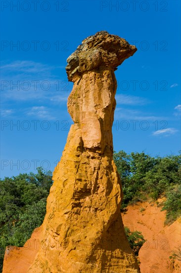 Rustrel France Provence Vaucluse sienna rock ocher erosion cliff sculptures cliff pillars trees wood forest,