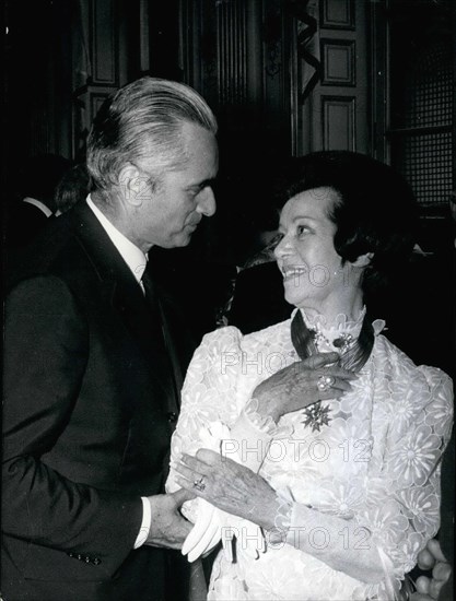 Jul. 20, 1971 - Opera singer Lily Pons received the National Order of Merit Cross yesterday during a reception held at the Matignon Hotel. Jacques Chaban-Delmas presented the award. He is seen here congratulating her after the presentation.